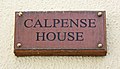 Plaque at the entrance to Calpense House.