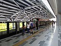 MRT Putrajaya Line train approach the station.