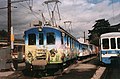 Train en gare d'Aigle avec une automotrice ancienne