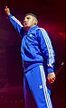 Spanish rapper Morad wearing a tracksuit during a concert