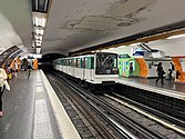 MP 73 rolling stock on Line 6 at Montparnasse–Bienvenüe