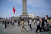 People protesting near the Monument to the People's Heroes
