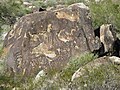 Chipping petroglyph on the White Tank Mountain Regional Park Waterfall Trail, Arizona
