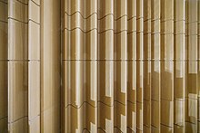 Detail view of acoustic wood wall paneling