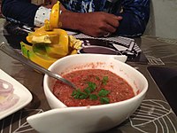 Tomato chutney prepared using coriander and garlic