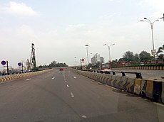 U-turn overpass near Kopar Khairane for north-bound vehicles heading towards industrial area on the east side.