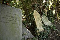 Tottering Victorian headstones in Woolaton, in Nottingham, England