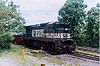 EFVM BB40-8M #1001 loading an 80 iron ore cars at Caue mine. Itabirá, MG – BR, in 2004.