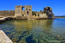 Castle wall overlooking a port