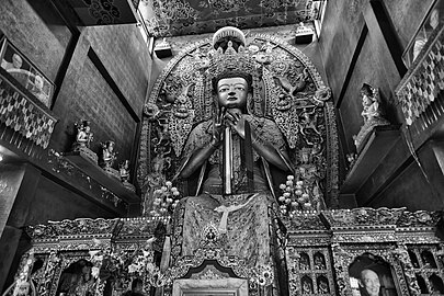 A statue of Maitreya Buddha inside Trikal Maitreya Buddha Vihara (Jamchen Lhakhang Monastery) at Bouddhanath premises, Kathmandu, Nepal