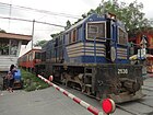 DEL 2538 hauling a Kiha 52 DMU at Santa Mesa, Maynila