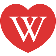 Impression of red heart with language glyphs inside puzzle pieces similar to Wikipedia Global Logo and with "Wikilove" at bottom