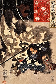 Yamamoto Kansuke fighting a giant boar, in a woodblock print by Utagawa Kuniyoshi.