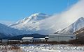 False Pass School and Roundtop volcano.