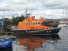 Lifeboats in Arklow Harbour, Ireland. Orange is chosen for lifeboats and lifesaving jackets because of its high visibility.