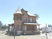 The Dougherty-Peterson House was built in 1899 and is located at 2141 W. Washington St. The house is listed as historic by the Phoenix Historic Property Register.