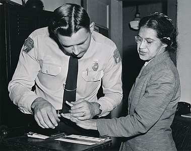 Rosa Parks being fingerprinted by D.H. Lackey at Montgomery bus boycott, by the Associated Press (restored by Adam Cuerden)