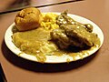 Image 36 Smothered chicken, mashed potatoes and gravy, macaroni and cheese and roll (from Culture of Arkansas)
