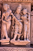 Cross-legged apsara and Vishnu-Lakshmi
