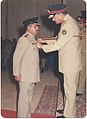 Colonel Salman Ahmed, great-grandson of Shaykh Altaf Hussain 19th in direct descent from Amir Kulal being awarded Sitara-e-Basalat by the Vice Chief of Army Staff at Rawalpindi, 1985