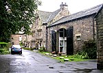 Numbers 3 to 11 (Esholt Old Hall) and adjoining barn