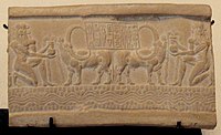 Impression of a cylinder seal of the Akkadian Empire, with the label: "The Divine Sharkalisharri Prince of Akkad, Ibni-Sharrum the Scribe his servant." The long-horned water buffalo is thought to have come from the Indus Valley, and testifies to exchanges with Meluhha, the Indus Valley Civilisation. c. 2217–2193 BC. Louvre Museum.[91][92][93]