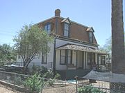 The Judge Charles A. Tweed House, built in 1880 and located at 1611 W. Filmore St. On April 14, 1870, Judge Tweed was appointed an Associate Justice to the Arizona Territorial Supreme Court. Tweed then moved to Arizona Territory and was appointed to serve two terms as an Associate Justice of the Arizona Territorial Supreme Court. The house is listed as historic by the Phoenix Historic Property Register.
