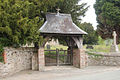 Lychgate designed by John Douglas at St Michael's Church, Manafon, Powys