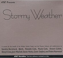 A white paper insert displaying the album's title and artists in similar fonts.