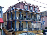 J. F. Fryer cottage, Cape May, New Jersey (1878–79). The pierced-tile inserts in the railings are believed to have come from the Japanese Pavilion at the 1876 Centennial Exposition.