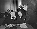 Image 21John L. Lewis (right, President of the United Mine Workers, confers with Thomas Kennedy (left), UMW Secretary-Treasurer of the UMW, and a UMW official at the War Labor Board in 1943 about a coal miners' strike.