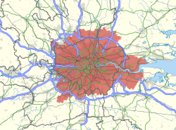 Map of the London area, with the metropolitan area as defined by the London Travel to Work Area highlighted in red