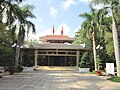 The building was built after 1975 to surround and preserve the temple