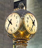 Large four-sided brass clock