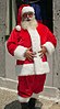 A man dressed in a Santa suit