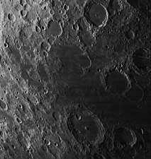 Oblique Lunar Orbiter 4 image of the western portion of Mare Marginis. The large crater to the south is Neper.