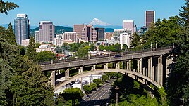 Downtown Portland with Mount Hood in the background and Vista Bridge in the foreground