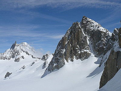 West face of Tour Ronde showing Gervasutti Couloir and the smaller Rebuffat Couloir to its left. The Dent du Géant is clearly visible in the distance.