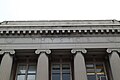 Closeup of "Physics" engraved on the front of Tate Hall