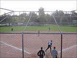 Softball action at Crosby Memorial Park