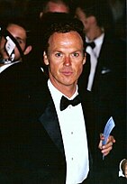 A formally-dressed Michael Keaton