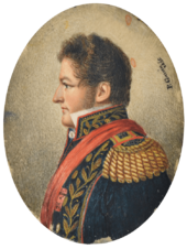 "Half length painted portrait of a man with curly auburn hair and sideburns facing left and wearing an elaborate military tunic embroidered in gold with heavy epaulettes, high embroidered collar and a red sash."