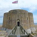 ☎∈ The Aldeburgh Martello Tower from across its bridge.