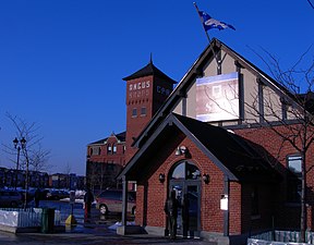 An Angus Shops building converted into a restaurant with an outdoor terrasse to the left.