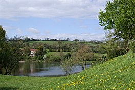 A lake surrounded by fields