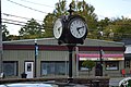 Town clock and pizzeria