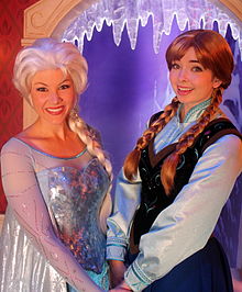A smiling Elsa and Anna