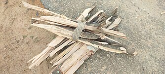 Firewood is commonly processed by axing and cutting it into smaller pieces for cooking purposes