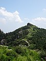 The castle walls, winding up the mountain (2004)