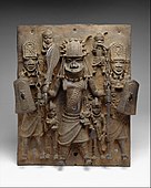 Plaque with warriors and attendants; 16th–17th century; brass; height: 47.6 cm (183⁄4 in.); Metropolitan Museum of Art (New York City)
